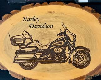 Carved in wood is better than stone.  And easier to work with.