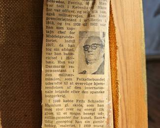 Reverse of Schroeder painting with newspaper clipping.