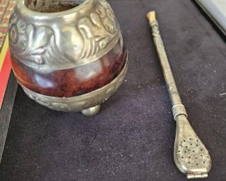 Yerba Mate (cup) and bombilla (straw)--a traditional South American beverage (Corrected description,  thanks to s very smart person).