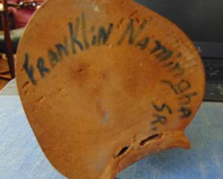 Artist's signature.