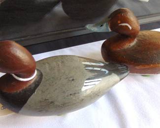 Sink-boat decoys (painted iron) folk art, sold individually.