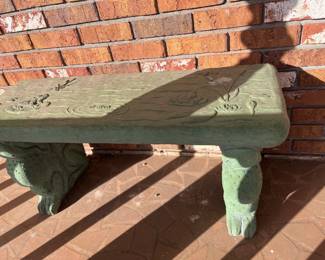 Concrete frog bench