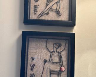 Wire art female figures in a shadowbox 