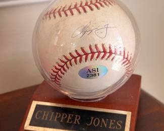 Chipper Jones signed baseball on display stand
