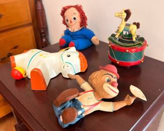 Vintage Raggedy Andy doll, wooden pull toy horse, carousel music box toy