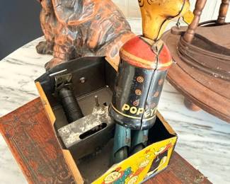 Vintage Popeye tin mechanical toy, collectible