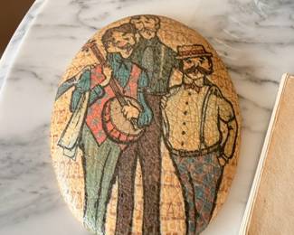 Vintage folk art painted stone, musicians with banjo