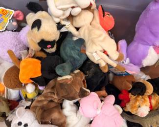 Large lot of stuffed animals and plush toys, assorted characters