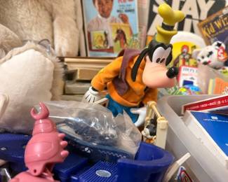 Assorted vintage toys, Disney Goofy figure, Ty Beanie Babies, stuffed animals