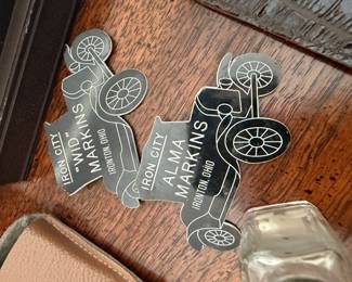 Vintage metal motorcycle-shaped name tags, Iron City Ironton Ohio memorabilia