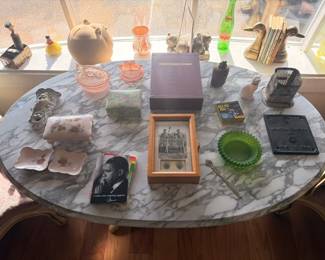 Marble-top oval coffee table, depression glass, duck bookends, porcelain dishes