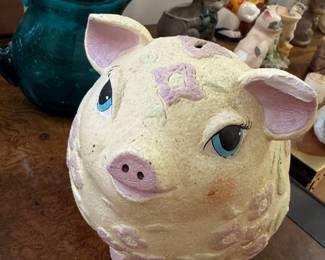 Vintage ceramic pig figurine planter with flower accent