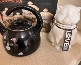 Black enamel tea kettle, ceramic cat cookie jar, kitchen collectibles
