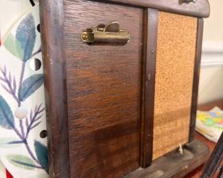 Antique wooden storage box with brass latch, vintage keepsake chest