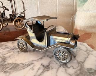 Copper metal antique Model T car sculpture on wooden base