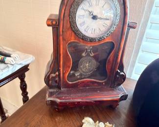 Antique wood cathedral-style mantel clock