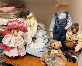 Collectible folk art dolls, farmer doll in overalls, porcelain dolls in dresses