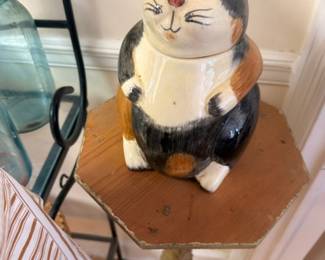 Vintage ceramic tuxedo cat figurine with bow tie, collectible cookie jar