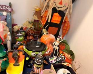 Halloween decorations, scarecrow figure, pumpkins, skeleton, witch collectibles