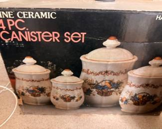 Fine ceramic 4-piece canister set, new in box, floral design