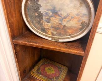 Small wooden corner shelf with antique oval serving tray, framed art