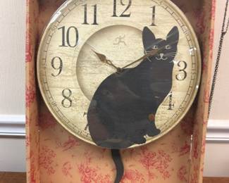 Infinity Instruments black cat wall clock with pendulum tail, in box