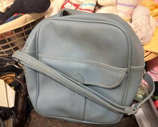 Vintage blue leather travel bag, retro carry-on