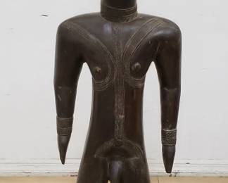 African carved wood nude statue on metal base