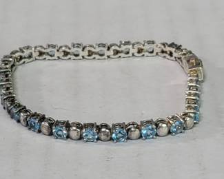 Thai sterling silver and blue topaz bracelet