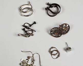 Sterling silver earrings and one single earring