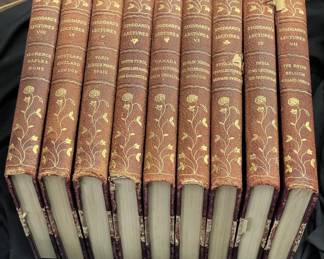 Set of 9 antique John stoddard’s leather books