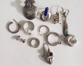 Group of mismatched sterling silver earrings