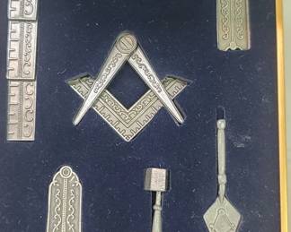 Set of miniature Masonic working tools in a velvet case