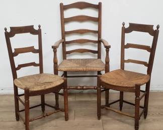3 vintage ladder-back chairs with rush seats