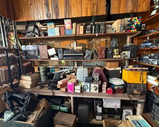 Movie Cameras, Camera Bags, and more, will be more organized than this, working on it now.