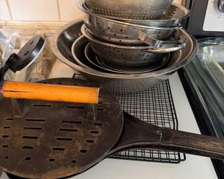 Colanders, mixing bowls, glass cutting boards