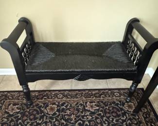 Black Wooden Bench with Turned Spindles and Woven Seat