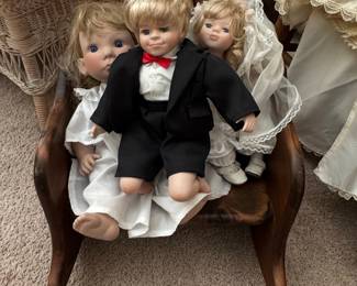 Kissing Bride and Groom Porcelain Dolls with Child Doll