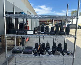 Lot of Motorola Radios and Charging Bases including Radius SP50, P110 Walkie Talkies, XTL1500 Mobile Radio