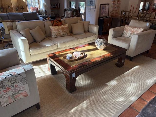 Upholstered furnishings and vintage Ming style coffee table with woven seagrass top