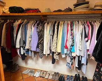 A closet full of high quality women's clothing and accessories