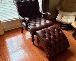 #4	Brown leather button seat and back chair with ottaman as is cat scratch	 $200.00 			