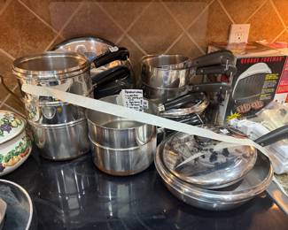 #48	Revere Ware - Set of 16 pieces	 $100.00 			