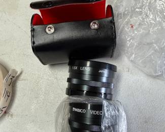 #114	Amico Lens w/2 in case - V3100   1.5X , 52MM	 $30.00 			