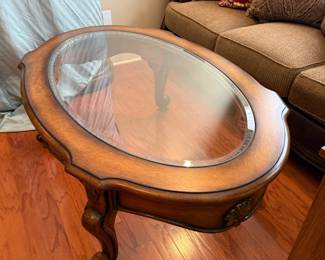 #18	Wood Oval Coffee Table w/Glass Top - 56x35x21	 $100.00 			