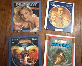 Lots of 1970s CED video discs and 2 CED disc players