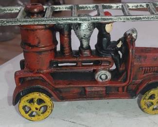 Cast iron toy fireman truck