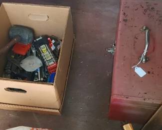 Red tool box full of tools