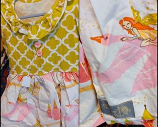 Eleanor Rose brand "Swan Princess" dress, featuring a yellow quatrefoil pattern top with ruffle details and a white skirt patterned with fairies and castles 