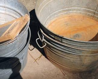 Lots of antique metal wash tubs